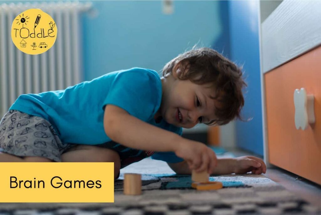 Child playing with a game and a caption that reads Brain Games